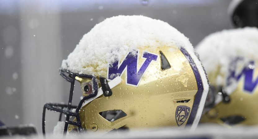 Washington Huskies helmet sits during a football game against the Washington State Cougars in the second half at Martin Stadium. The Huskies won 28-15.