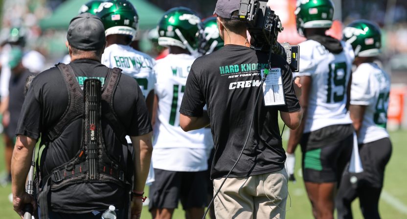 Jul 22, 2023; Florham Park, NJ, USA; An NFL Films crew for the HBO television series Hard Knocks stand behind New York Jets receivers during the New York Jets Training Camp at Atlantic Health Jets Training Center. Mandatory Credit: Vincent Carchietta-USA TODAY Sports